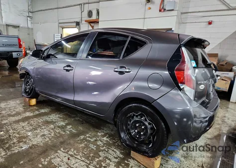 2015 Toyota Prius C Two z USA, uszkodzony, nr VIN JTDKDTB36F1108826